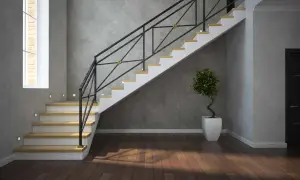 Nowoczesne schody z żywicy, z metalową balustradą i drewnianymi stopniami. Elegancki dodatek do każdego wnętrza, który podkreśla jego styl.