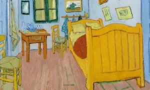 Sypialnia Van Gogha, pełna żółci i błękitu, z charakterystycznymi dla jego stylu rysunkami na ścianach.