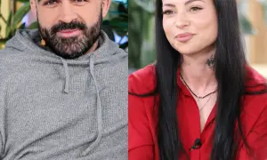 Akop i Sylwia Szostak, uśmiechnięci i patrzący w różne strony. On w szarej bluzie, ona w czerwonej koszuli.