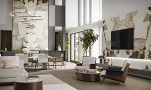 Elegante salotto e sala da pranzo con pareti in pietra naturale, mobili moderni e illuminazione a sospensione.