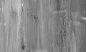 Textura de madera con vetas verticales, como si fuera una **pintura a la cal** aplicada sobre tablones.