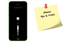 Zielony iPhone w trybie awaryjnym z ikoną iTunes i kablem. Obok żółta karteczka z napisem "iPhone tips & tricks". Dowiedz się, jak awaryjnie wyłączyć iPhone.