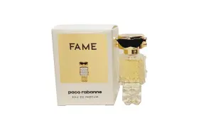 Paco Rabanne Fame – flakonik perfum i pudełko z motywem ikonicznej postaci w okularach przeciwsłonecznych.