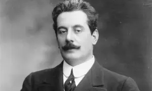Giacomo Puccini, kompozytor, który napisał opery takie jak "Cyganeria" i "Tosca", na portrecie.