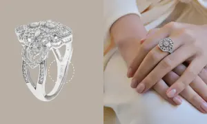 Anillo de plata 925 con incrustaciones de diamantes, con un diseño floral y de corazones. La marca de plata 925 es visible.
