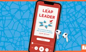 En mobiltelefon visar en ljudbok om ledarskap, "The Leap to Leader". Kanske kan den hjälpa till att motverka dålig arbetsmoral.