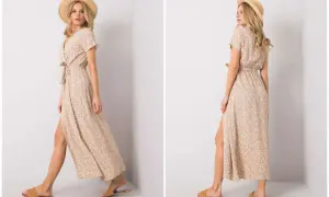 Kobieta w letniej sukience w kwiaty i słomkowym kapeluszu, idealna stylizacja w stylu cottagecore.