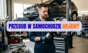 Mechanik pokazuje przegub w samochodzie, który wymaga wymiany.