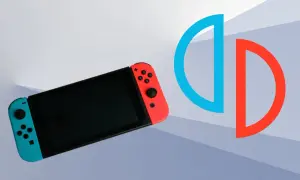 Konsola Nintendo Switch z niebieskim i czerwonym Joy-Conem obok symbolu podzielonego okręgu.