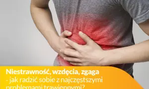Osoba trzyma się za brzuch, odczuwając ból brzucha po jedzeniu. Czerwony obszar na brzuchu symbolizuje dyskomfort.