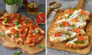Två pizzor på träskärbrädor. En med pepperoni och basilika, den andra med gräddfil, rödlök, dill och rom. Båda ser ut att ha en härlig pizza sås.