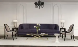 Elegancka sofa i fotele tworzą przytulną przestrzeń w klasycznych wnętrzach.