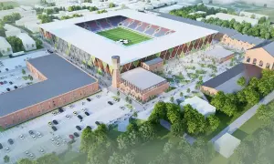 Nowy stadion Rakowa z imponującą pojemnością, otoczony historyczną architekturą i nowoczesnymi przestrzeniami.