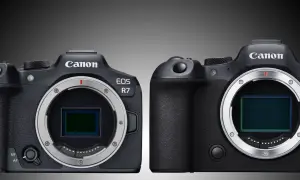Due corpi macchina Canon EOS R7 e un altro modello Canon EOS a confronto, con sensori visibili.