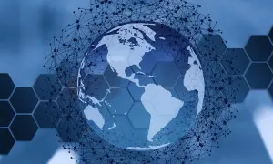 Globus z siatką połączeń, symbolizujący sieć globalną. FQDN co to? To nazwa domenowa, która jednoznacznie identyfikuje urządzenie w sieci.