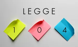 Novità Legge 104: focus sul part-time. Tre post-it colorati con numeri 1, 0, 4 compongono la cifra.