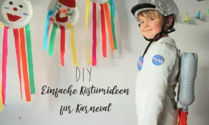 Kind im Astronauten-DIY-Kostüm mit Raketenrucksack aus Flasche. Einfache Kostüme für Kinder zum Selbermachen.