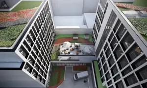 Nowoczesny budynek z zielonymi tarasami i patio, gdzie można odpocząć. To wizualizacja hotelu Meininger Kraków.