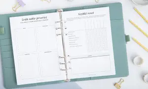 Otwarty planer dnia w pastelowej oprawie, z listą rzeczy sprawiających radość i sekcją "Szybki reset".