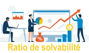 Des analystes financiers travaillent sur des graphiques et des données pour assurer la capacité de l'entreprise à être solvable.