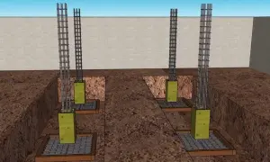 Ilustración de cómo hacer una cimentación: pilares de acero y encofrados de madera en zanjas.