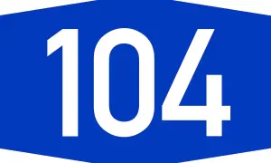 Il numero 104 su sfondo blu. Forse indica un percorso per chi necessita di assistenza, come per la legge 104 e l'acquisto di pannoloni.