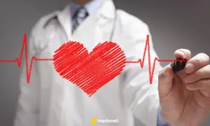 Lekarz rysuje serce i linię EKG, symbolizując troskę o zdrowie. Nitrendypina Egis pomaga utrzymać prawidłowe ciśnienie.