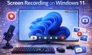 Nagrywanie ekranu Windows 11: monitor z ikonami, mikrofon, klawiatura i myszka.