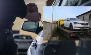 Próba kradzieży samochodu zakończona. Białe auto na lawecie, złodziej zatrzymany.