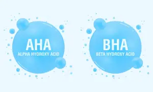 Dwa bąbelki z napisem AHA (Alpha Hydroxy Acid) i BHA (Beta Hydroxy Acid). Kwasy AHA jakie to? To składniki kosmetyków.