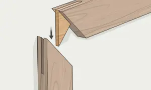 Ensamblaje de madera con un corte a inglete preciso, mostrando cómo encajan las piezas para formar una unión fuerte y limpia.