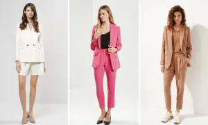Trzy kobiety w eleganckich stylizacjach. Jedna w białym garniturze ze spodenkami, druga w różowym z długimi spodniami, trzecia w beżowym. Co pod marynarkę damską? Różne opcje.