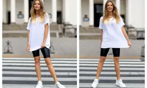 Modne kolarki stylizacje: biała oversize koszulka, czarne legginsy kolarki i białe sneakersy na pasach.