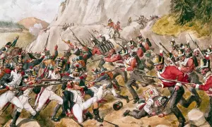 Intens strid under slaget vid Waterloo. Soldater i röda uniformer kämpar mot fienden i en kaotisk scen.