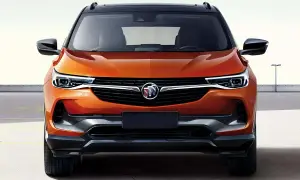Pomarańczowy Buick Encore z czarnym dachem, widok z przodu. Elegancki SUV gotowy na przygodę.