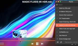Odtwarzanie pliku MAGIC FLUIDS 4K HDR.mkv z kolorowym, płynnym tłem.