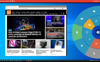 Na ekranie komputera widać stronę benchmark.pl z artykułami o technologii. Po prawej stronie ekranu znajduje się okrągłe menu z ikonami, które może przypominać interfejs AnyDesk.