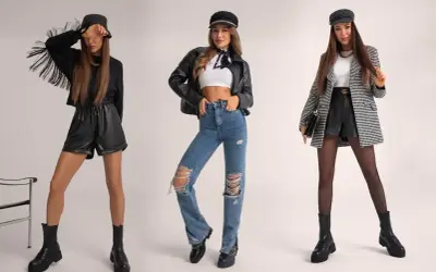 Trzy kobiety prezentują stylizacje w rockowym stylu: skórzane szorty z frędzlami, podarte jeansy i elegancki żakiet z krótkimi spodenkami.