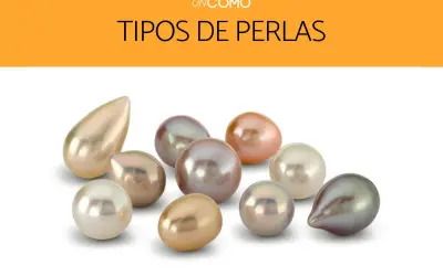 Variedad de tipos de perlas naturales, redondas y en forma de lágrima, en tonos blanco, rosa, dorado y grisáceo.