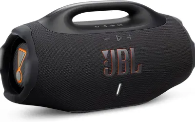 Enceinte JBL noire avec logo orange. Apprenez comment allumer une enceinte JBL pour profiter de votre musique.