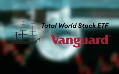 A silhouette of a tall ship sails across a blurred background, with "Total World Stock ETF" and the Vanguard logo.