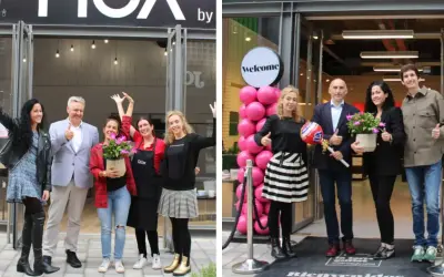 Inauguración de tienda en marketches torre outlet. Gente sonriente celebra la apertura con globos rosas y plantas.