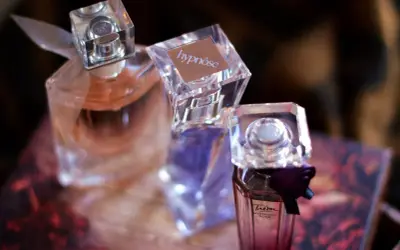 Trzy flakony perfum Lancôme: Hypnôse, Trésor Midnight Rose 75ml i jeden z różową wodą.