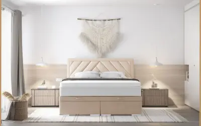 Minimalistyczna sypialnia z łóżkiem i materacem, ozdobiona makramą na ścianie.