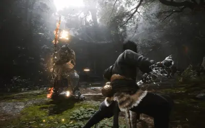 Wukong im Kampf gegen einen feurigen Gegner im Wald. Ein epischer Moment aus Black Myth: Wukong.
