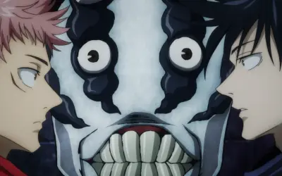 Yuji und Megumi blicken auf eine gruselige Maske. Ein Moment aus Jujutsu Kaisen, der die Spannung zeigt.