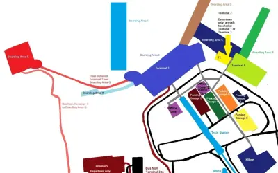 Schemat lotniska Fiumicino: terminale 1, 2, 3, 5, parkingi, stacja kolejowa, Hilton, połączenia autobusowe i kolejowe.