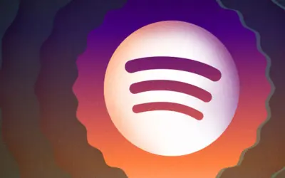 Spotify logo na tle falujących, gradientowych kolorów. Może to być grafika zapowiadająca top 10 artystów Spotify.