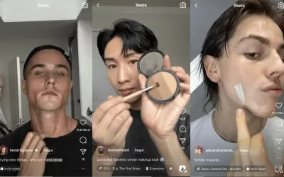 Uomo applica correttore per come coprire i brufoli. Altri due uomini mostrano prodotti per il trucco.