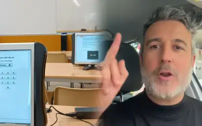 El profesor de la autoescuela sabe si has aprobado. Un hombre con barba gris habla a cámara, con un examen en pantalla al fondo.